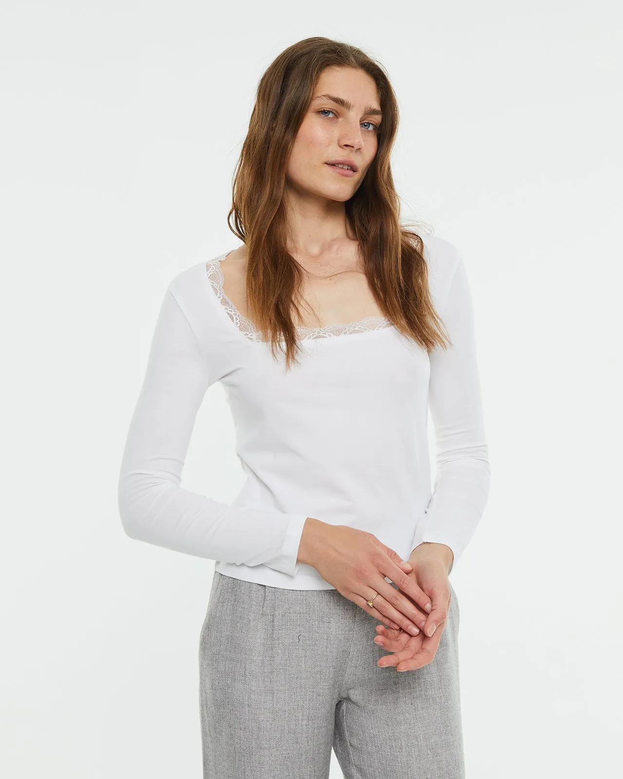 Camiseta crop ajustada manga larga