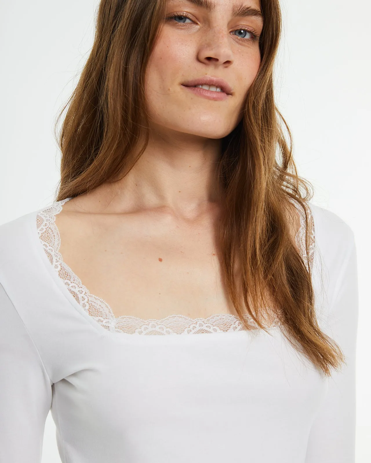 Camiseta crop ajustada manga larga