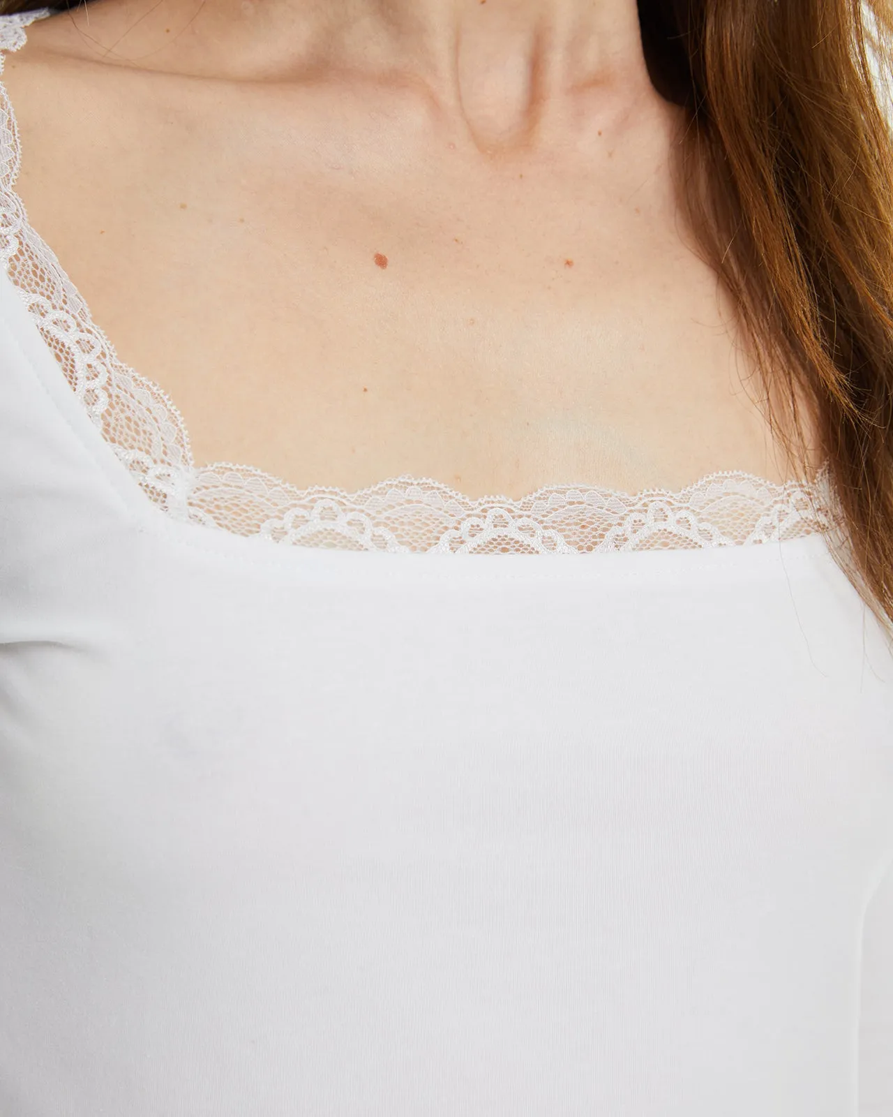 Camiseta crop ajustada manga larga