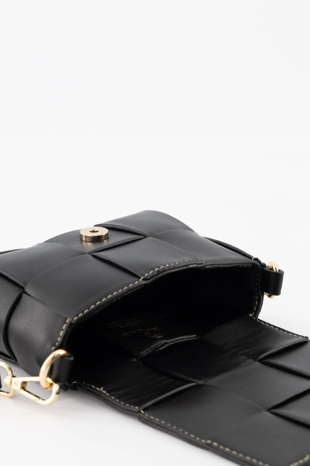 Mini bolso bandolera en piel vegana entrelazada color negro para mujer