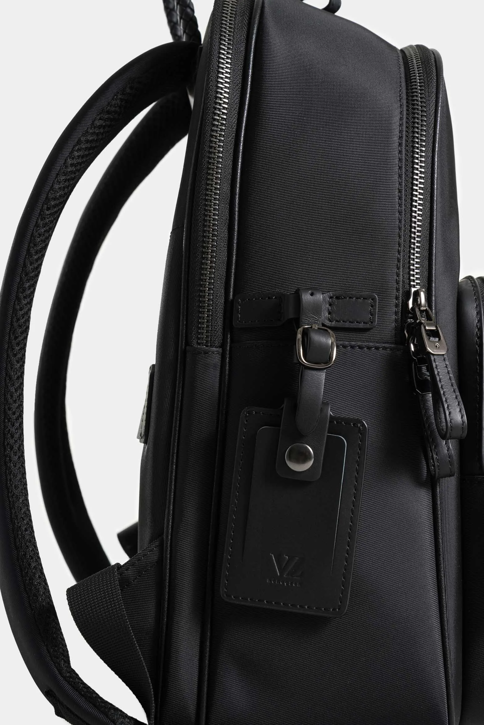 Tula morral legacy de cuero y nylon para mujer tag para viaje